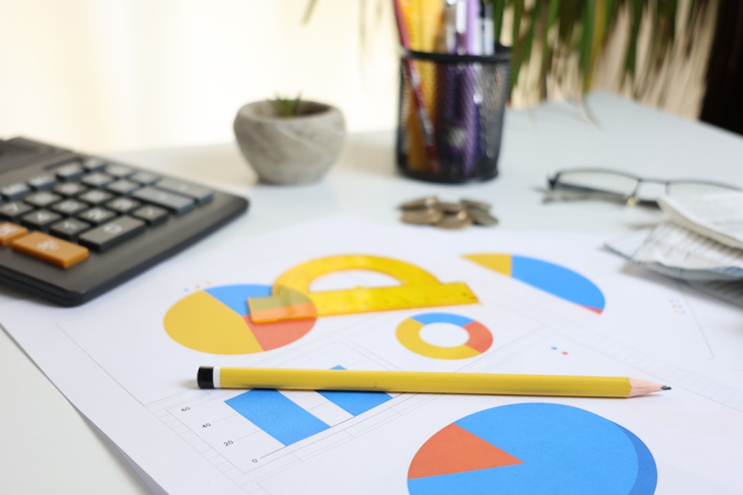 desk-with-calculator-charts-and-pencil-dspkrjyp644